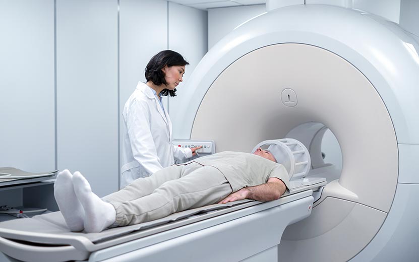 doctor-getting-patient-ready-for-ct-scan.jpg